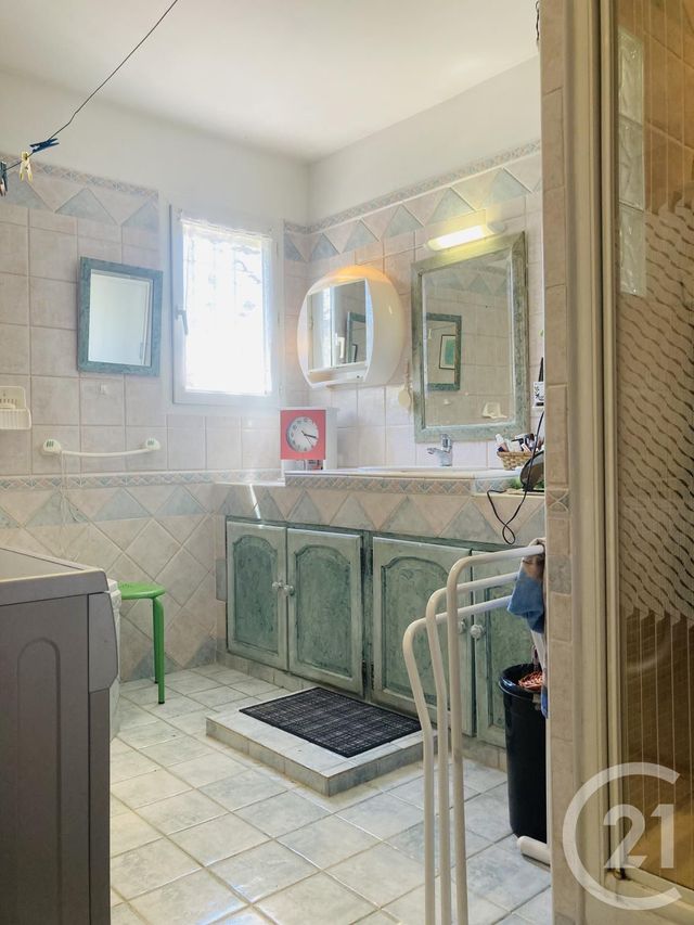 Afficher la photo en grand maison à vendre - 6 pièces - 152.0 m2 - LA LONDE LES MAURES - 83 - PROVENCE-ALPES-COTE-D-AZUR - Century 21 Agence Bordenave